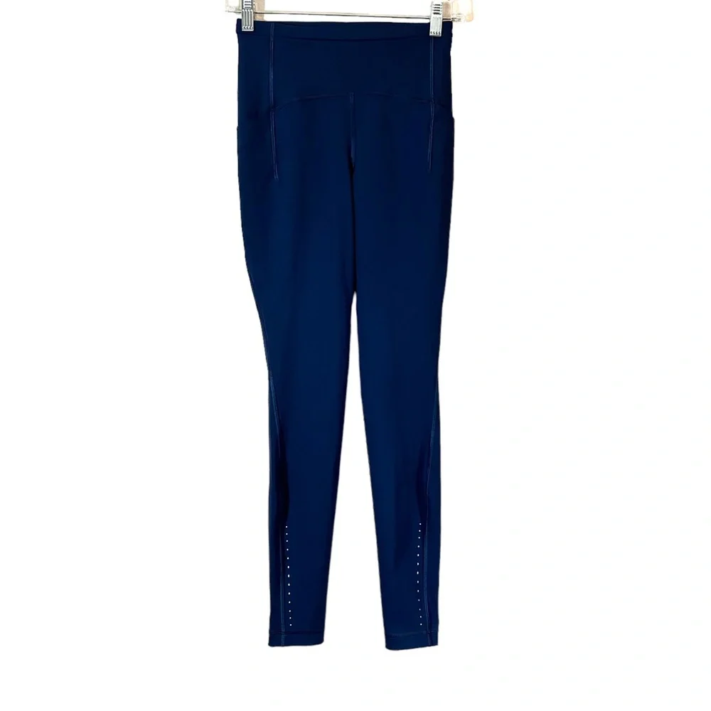 Lululemon Blue Leggings Pockets Size 4 
Back Zipper Pocket 
Side Pockets